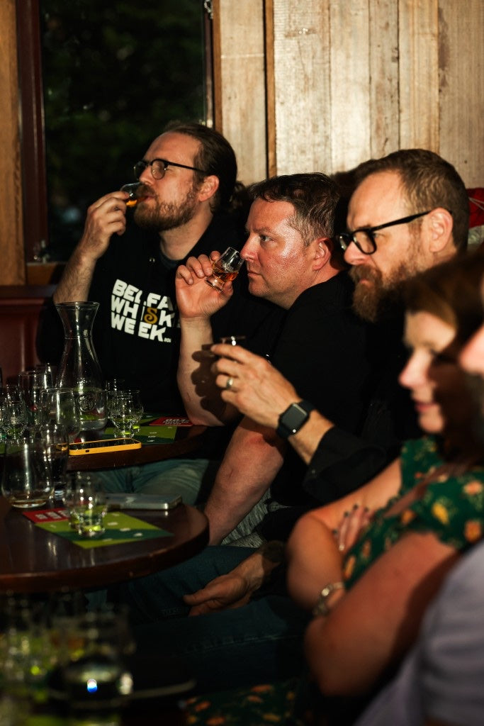 Guests nosing their drams during a guided tasting
