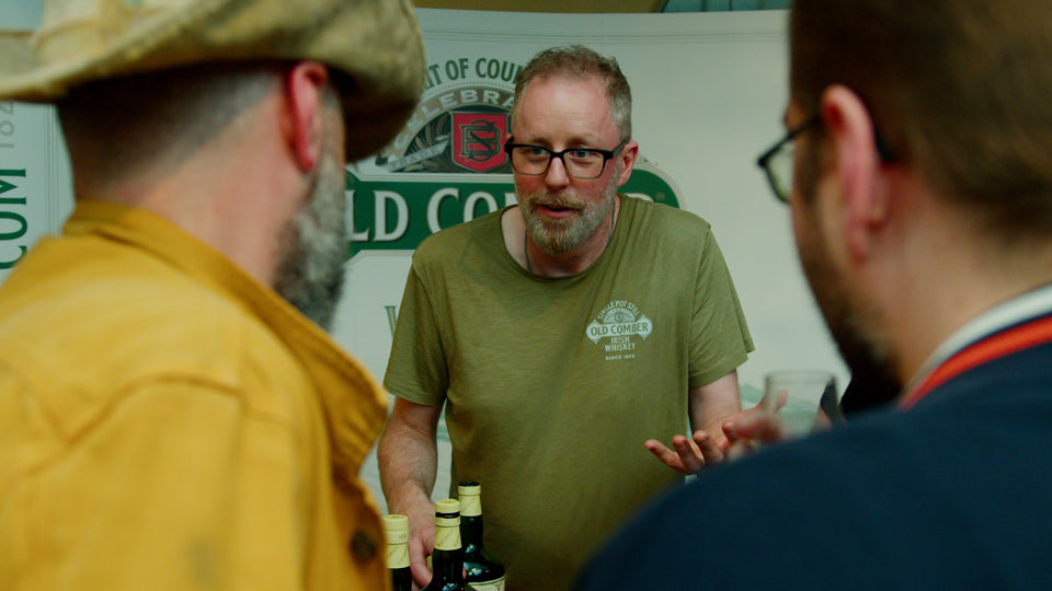 Old Comber Single Pot Still Irish Whiskey representative talking through expressions with guests at Belfast Whiskey Week