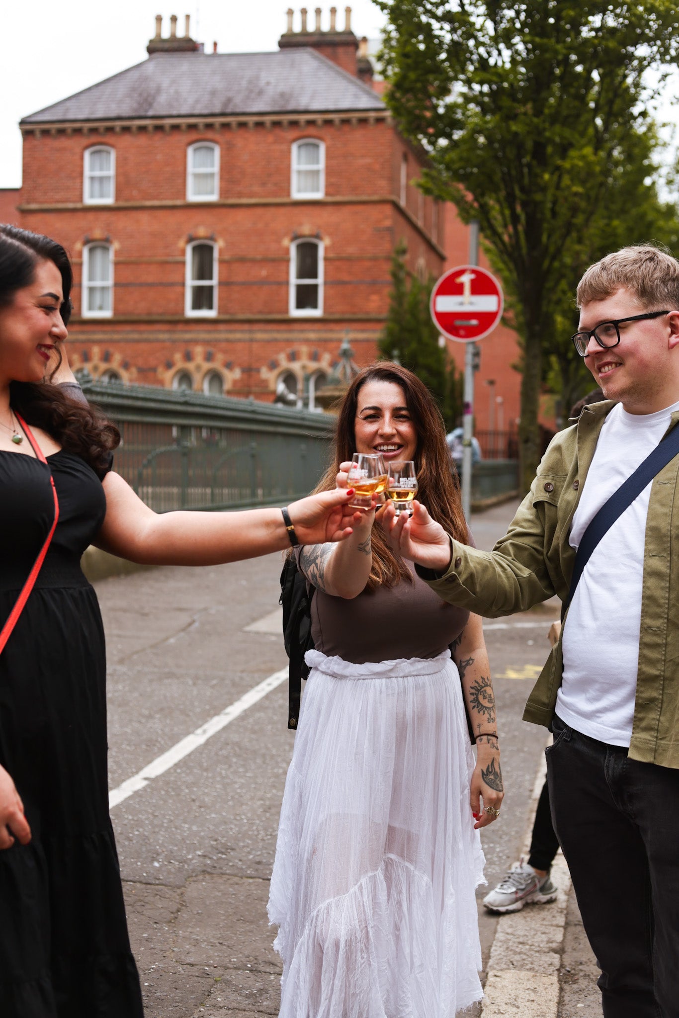 Street toast during the Belfast whiskey walking tour