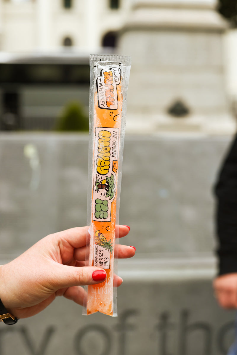 Close-up of the branded adult whiskey ice pop with ingredients