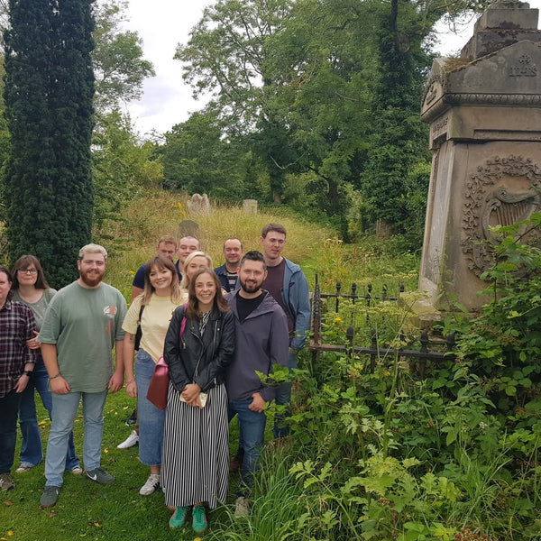 Tour group at Friar's Bush Graveyard on the Belfast Whiskey Week 2026 whiskey walking tour