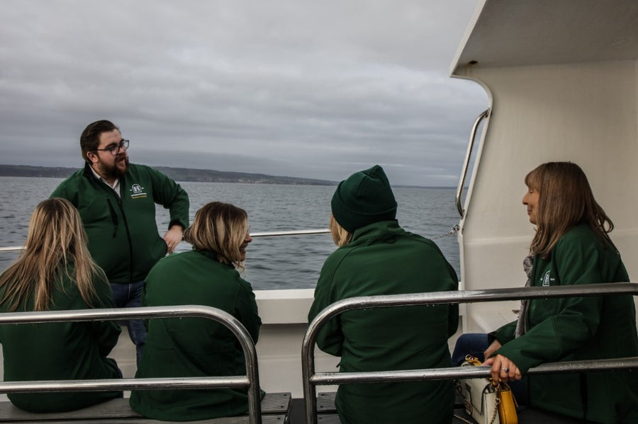 Guests aboard The Spirit of Carnlough on The Harbourview Hotel boat trip across the waters of Dalriada to Campbeltown
