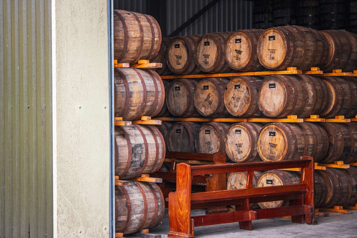 Casks racked in the maturation warehouse at Hinch Distillery
