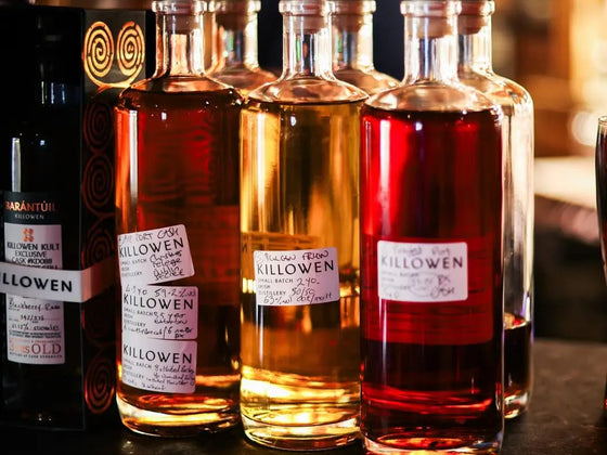 Contours of Killowen — Killowen whiskey bottle lineup on the bar