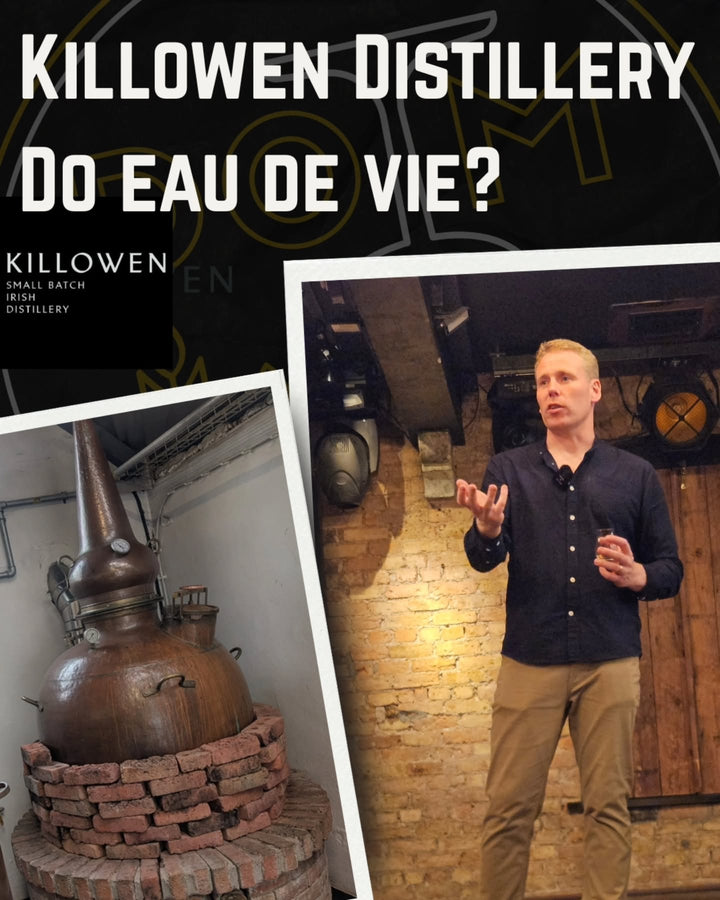 Killowen Distillery founder Brendan Carty presenting a tasting, with the copper pot still
