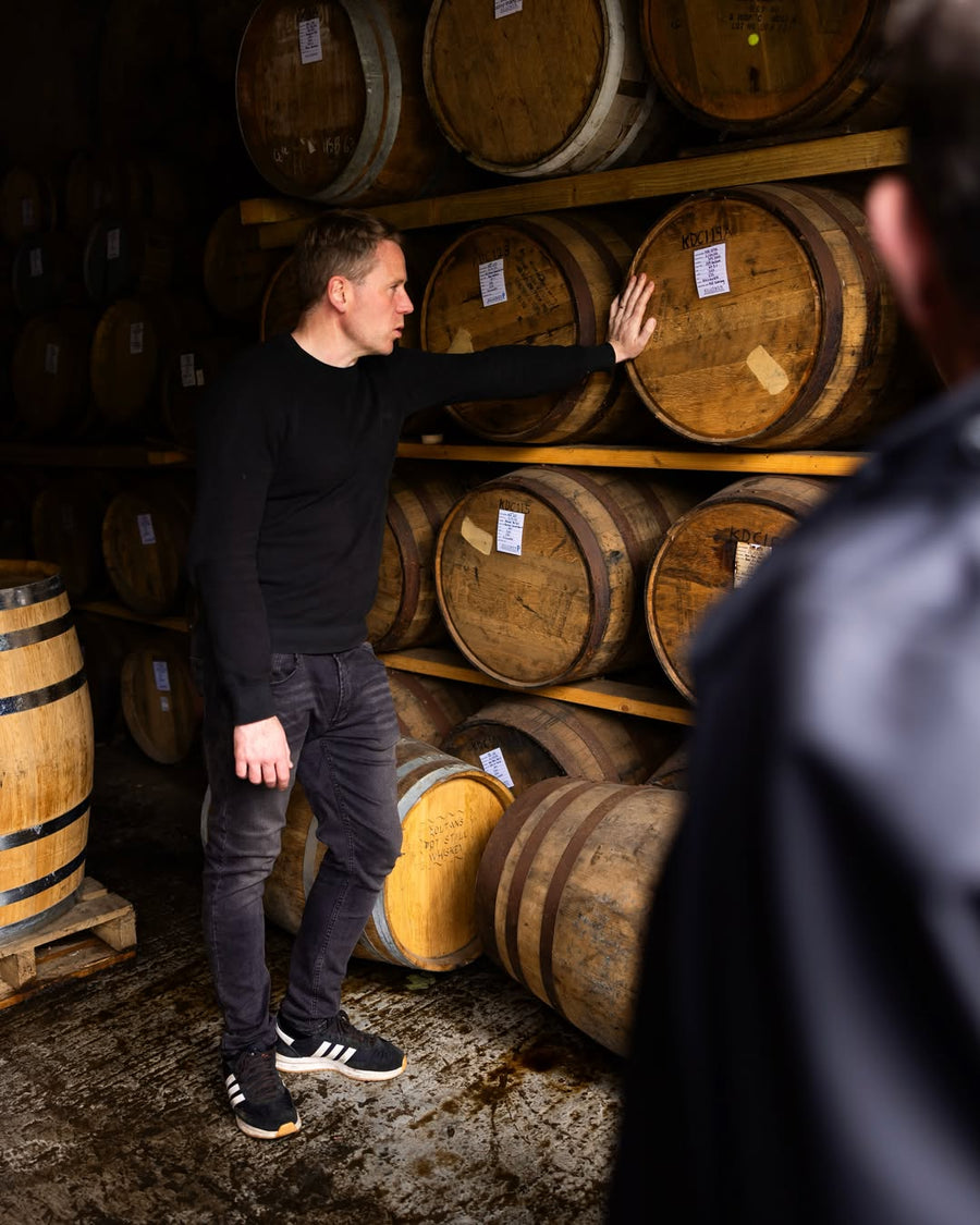 Killowen distiller Brendan Carty with maturing casks in the distillery warehouse